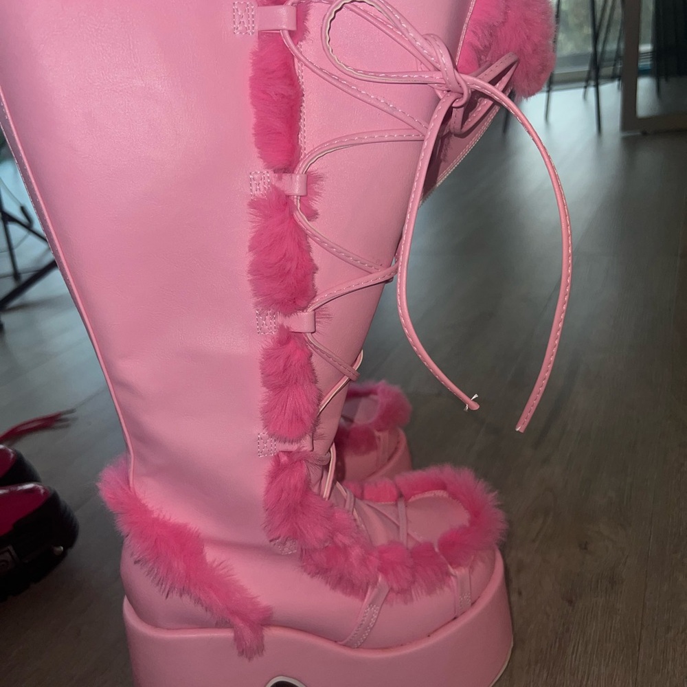 Demonia pastel pink winter lace up boots